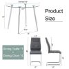 Table and chair set. (1 table+4 gray chairs) Round dining table with a 40 inch diameter glass tabletop and silver plated metal legs. 4 gray PU chairs