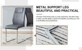 Table and chair set. (1 table+4 gray chairs) Round dining table with a 40 inch diameter glass tabletop and silver plated metal legs. 4 gray PU chairs