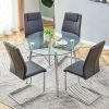 Table and chair set. (1 table+4 gray chairs) Round dining table with a 40 inch diameter glass tabletop and silver plated metal legs. 4 gray PU chairs